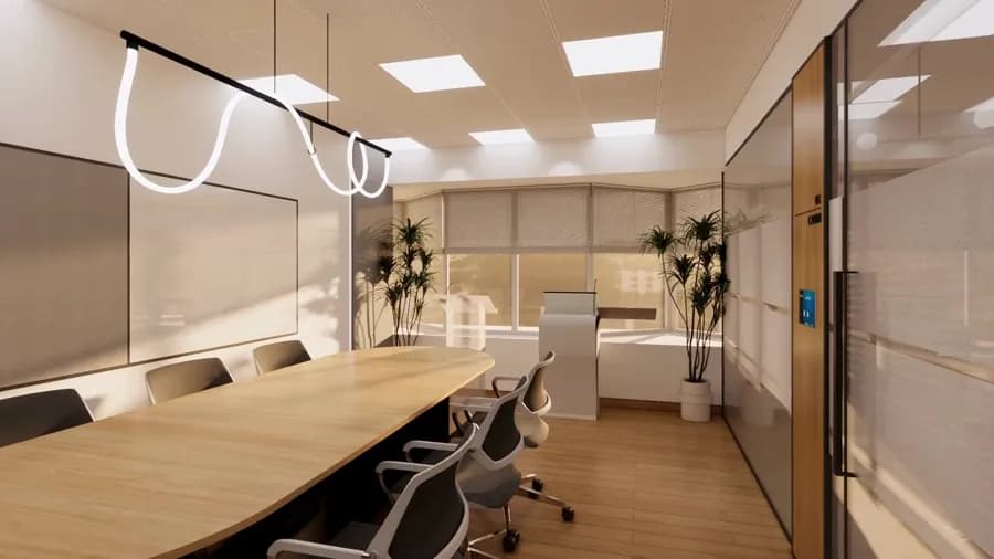 Huddle room with meeting table, chairs and office setup at the Experience Center