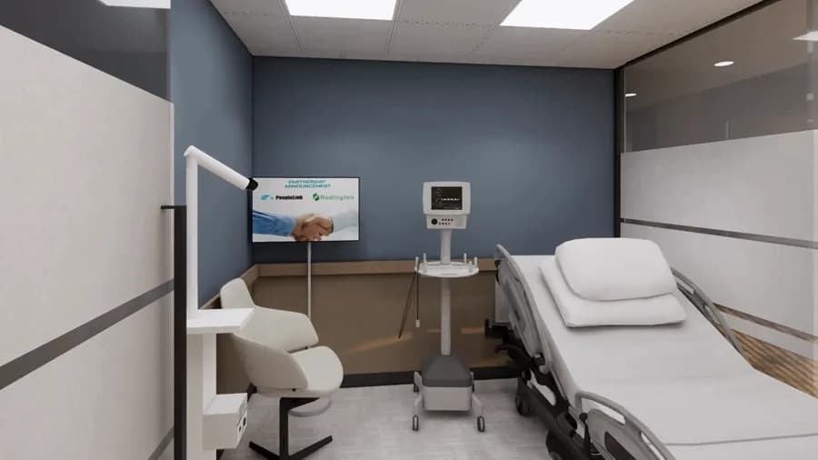 Telehealth suite with hospital bed, patient monitoring and remote consultation setup